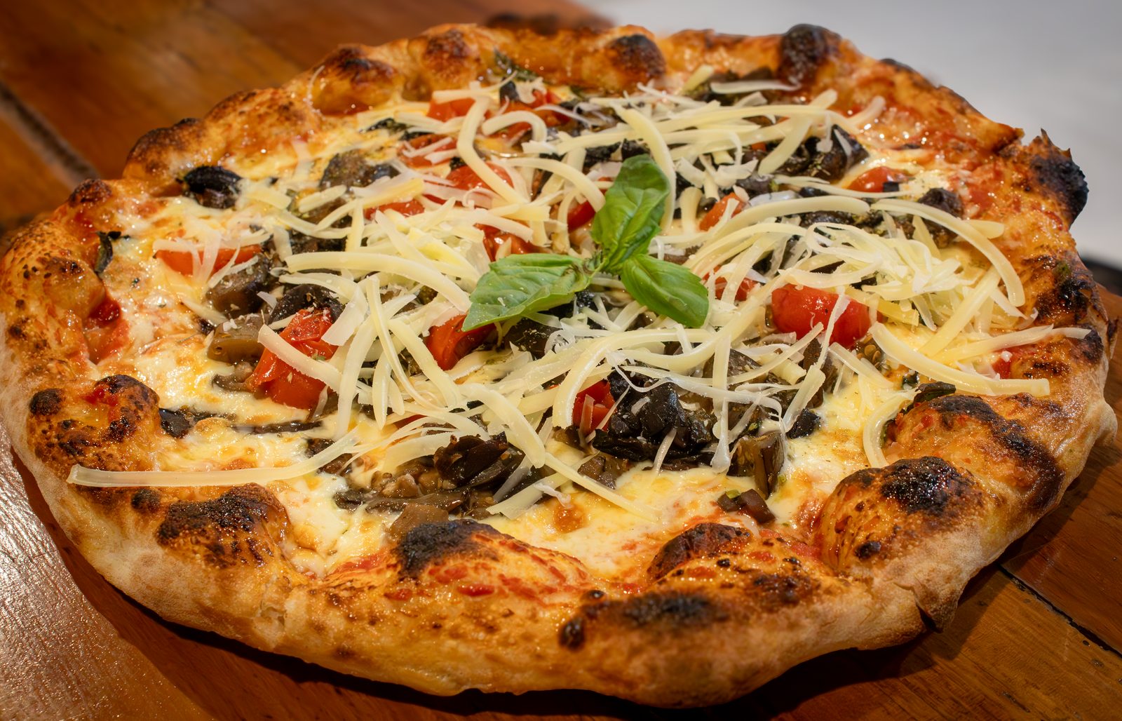 Ingredientes seleccionados visibles en pizza